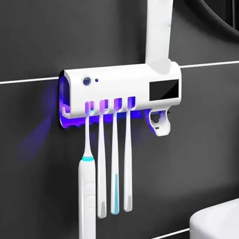 UV sterilizing toothbrush holder with toothpaste dispenser